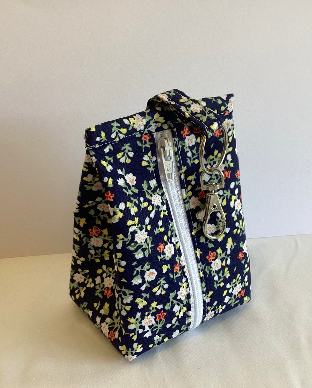 Multi Flowered  handmade triangular zipped coin and key pouch with lobster claw clasp