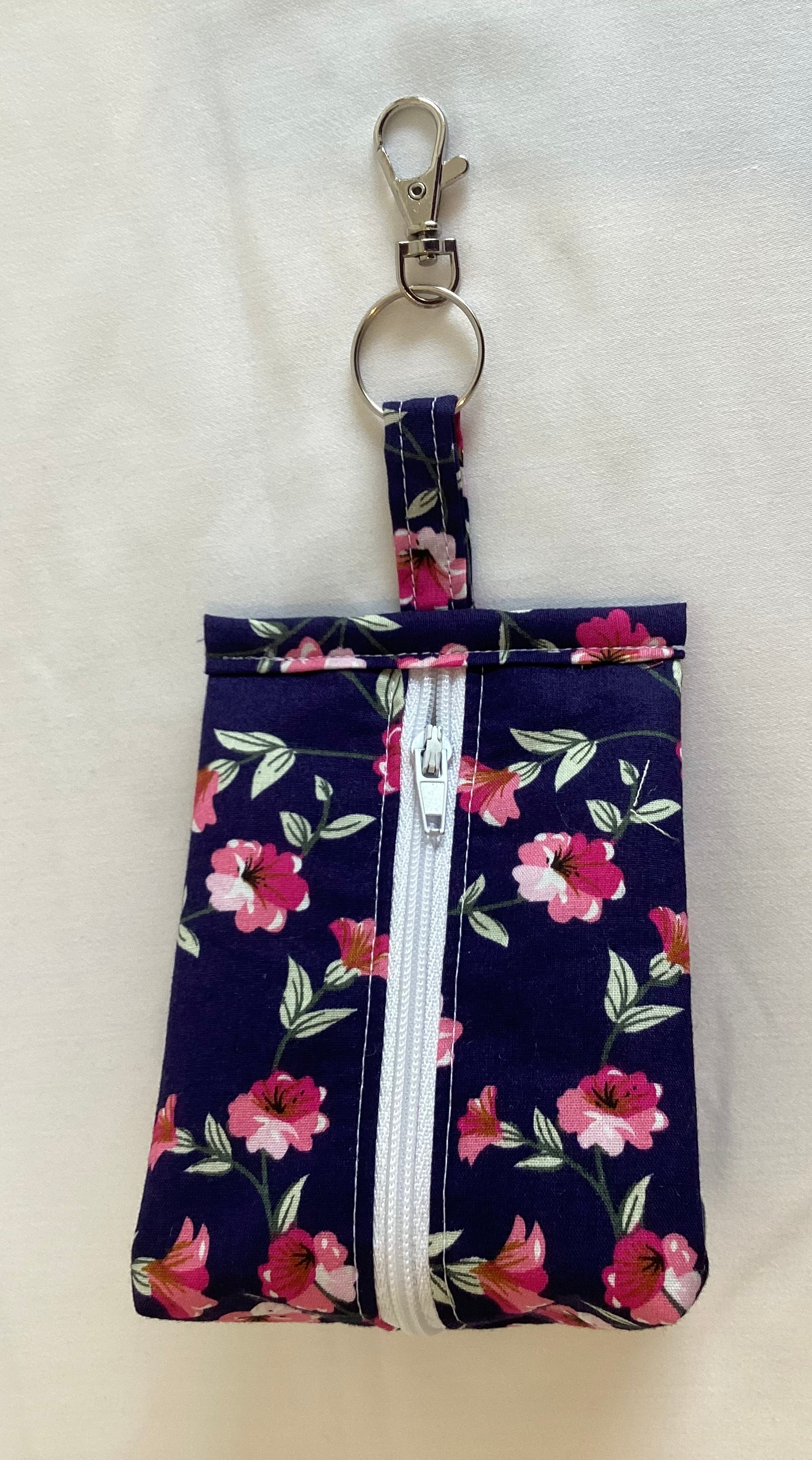 Navy Blue With Cerise Flowers Triangular Zipped Coin/Key Pouch With a Lobster Claw Clasp