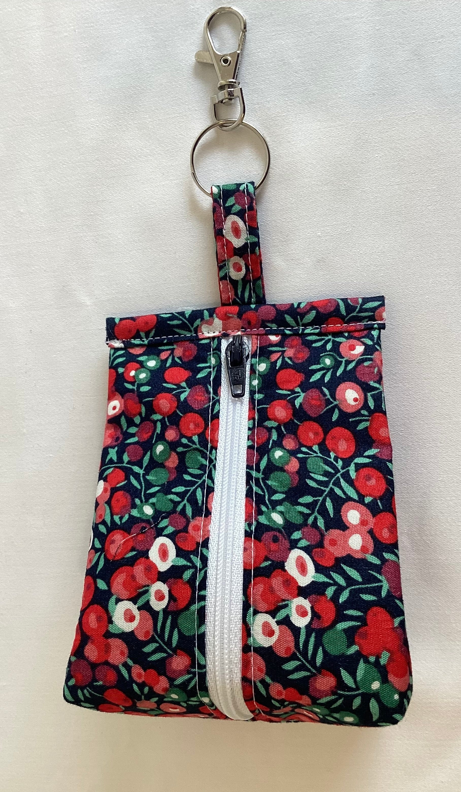 Red Flowered Triangular Zipped Coin/Key Pouch With a Lobster Claw Clasp